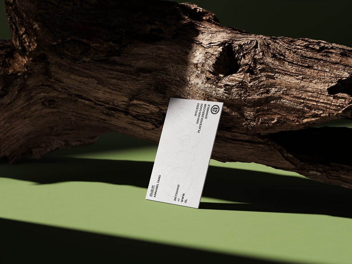 Abel business card hanging from a branch